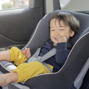 Baby Boy in Child Seat Smiling