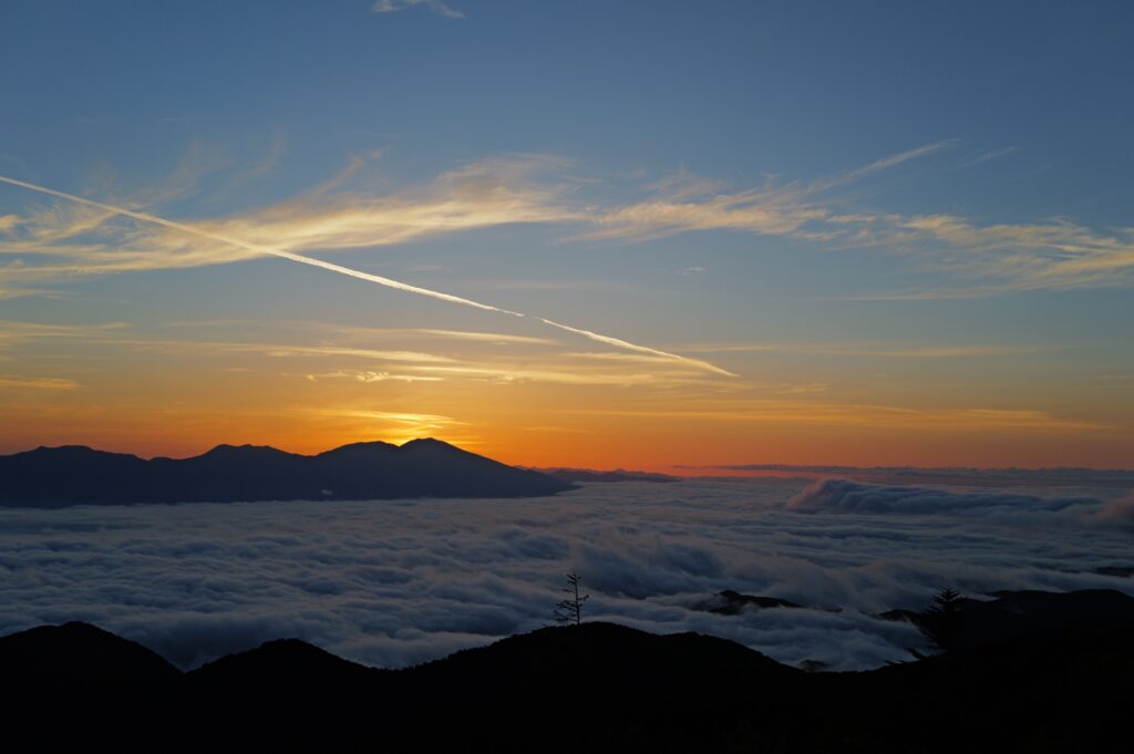 Mountain ridges above a sea of cloud at first light